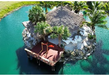 Aerial view of the island and bridge surrounded by turquoise water